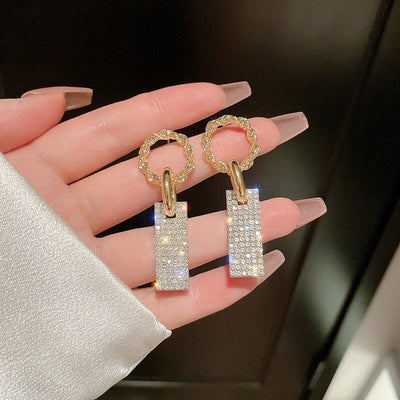 Pendientes Circonitas Lujosas en Plata y Baños con Brillantitos Incrustados