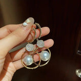 Pendientes con Cultured Perlas y Embezzled Balls