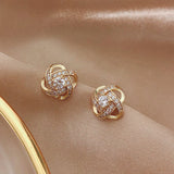 Spiral Floral Cristal Clover Pendientes